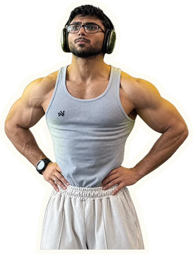 Fawad Haris in a training vest, hands on hips